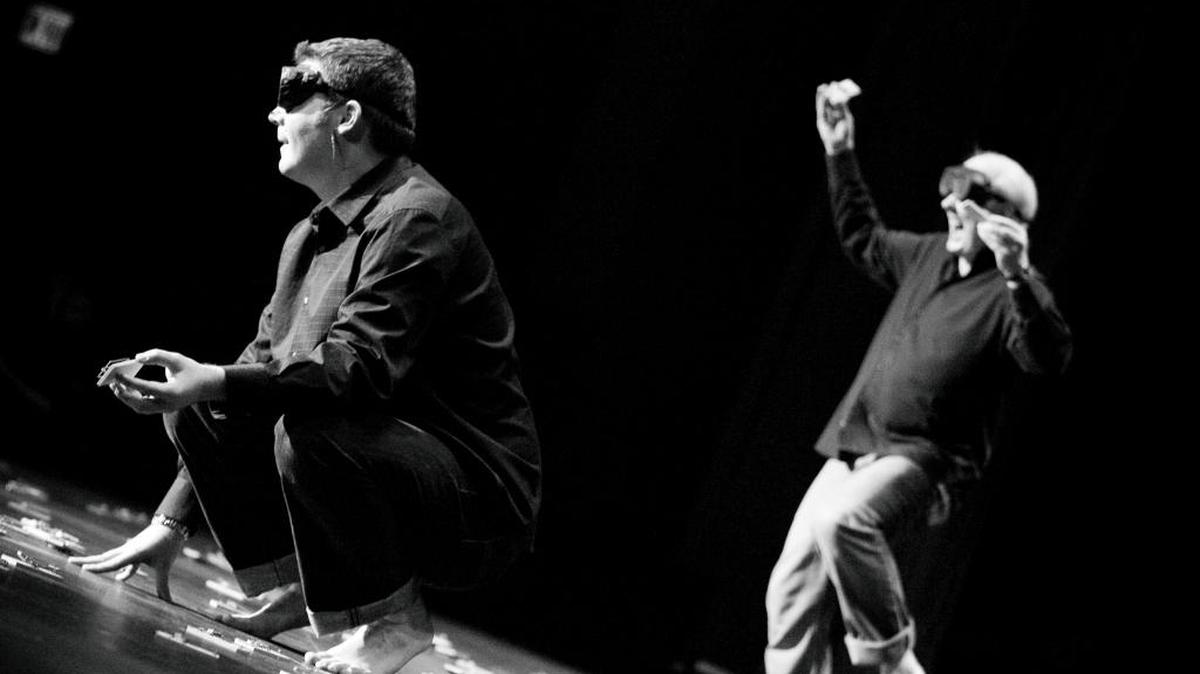Brad Sherwood, left, and Colin Mochrie perform the challenging and hysterical “Mousetrap Skit” in the “Two Man Group” show. Catch them at the Morrison Center on Saturday, April 23.