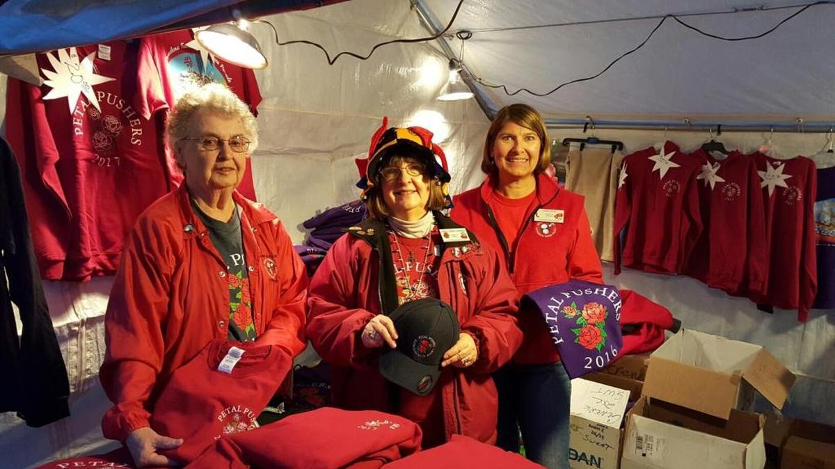 Nampa resident Linda Varnes, center, is helping with the Lutheran Hours Ministries float for the Tournament of Roses Parade in Pasadena, Calif. A classically trained artist, she has designed features on 16 floats over the past 34 years. She’s pictured here with fellow Petal Pushers Shirley Anderson and Katie Pike in the merchandise tent that she is helping to run this year.