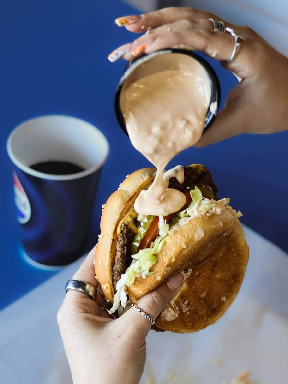 Make sure you’re following Bad Boy Burgers on TikTok or Instagram, and you’ll be biting into one of these bad boys.