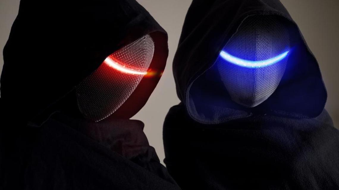 The Keeper, left, and The Seer of Boise’s most mysterious band, Magic Sword.