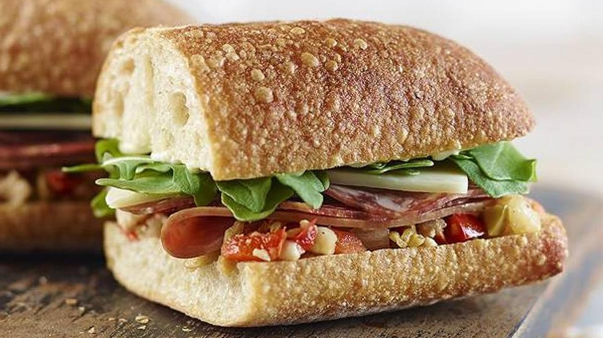 The Italian sandwich at Panera Bread: smoked, lean ham, Chianti wine salami, spicy sopressa and provolone with spicy giardiniera, basil mayo and fresh arugula on a hoagie roll.