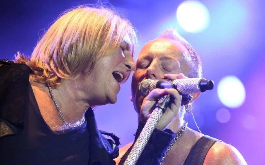 Joe Elliott, left, and Phil Collen perform with the band Def Leppard in this photo taken in 2012 in Los Angeles.