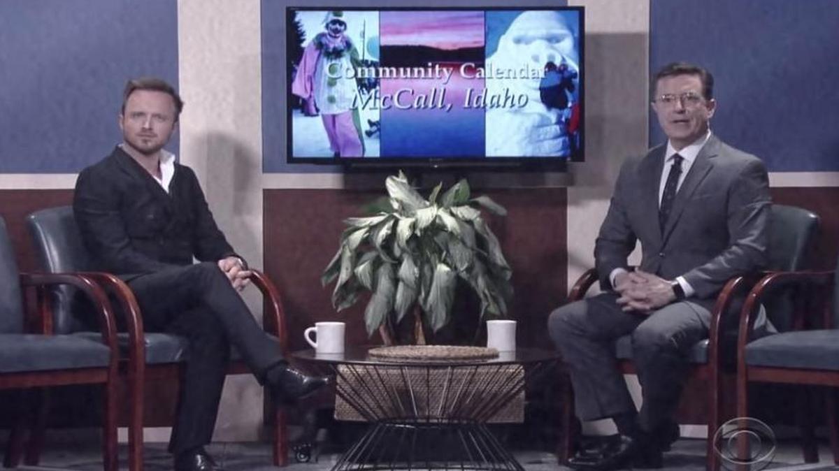 Aaron Paul, left, and Stephen Colbert in the McCall, Idaho, episode of “Community Calendar” on “The Late Show.”
