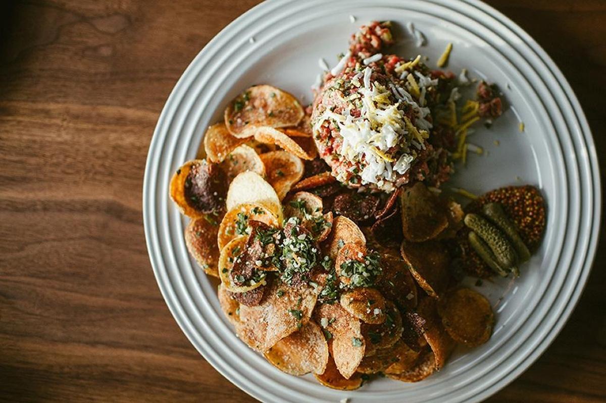 Beef tartare was one of the French-inspired dishes served at Petite 4.
