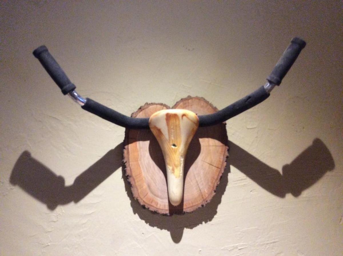 Art made from bicycle parts adorns the walls of the HandleBar.