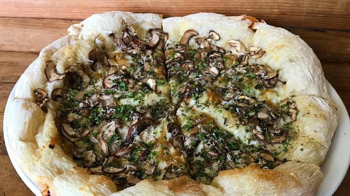 The Mushroom Party pizza ($17.50) includes market mushrooms, gruyere cheese and herbs.