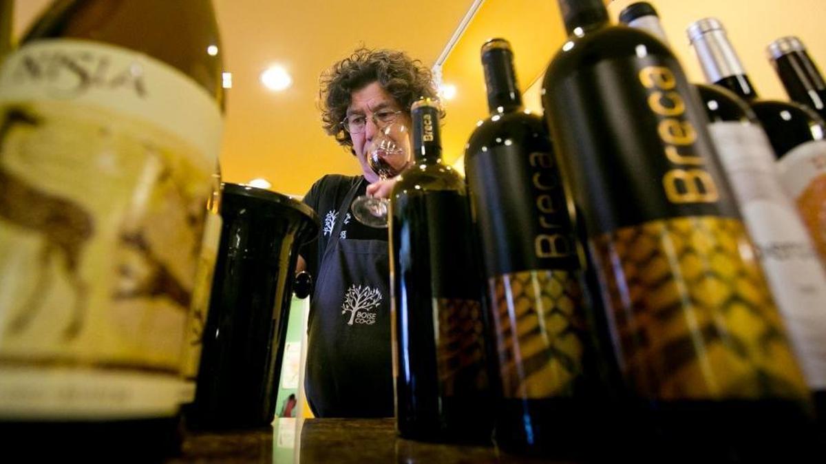 Wine Shop guru Divit Cardoza pours during a tasting event. Knowledgeable employees such as Cardoza will be part of the allure of the Boise Co-op’s new wine bar Uncorked!