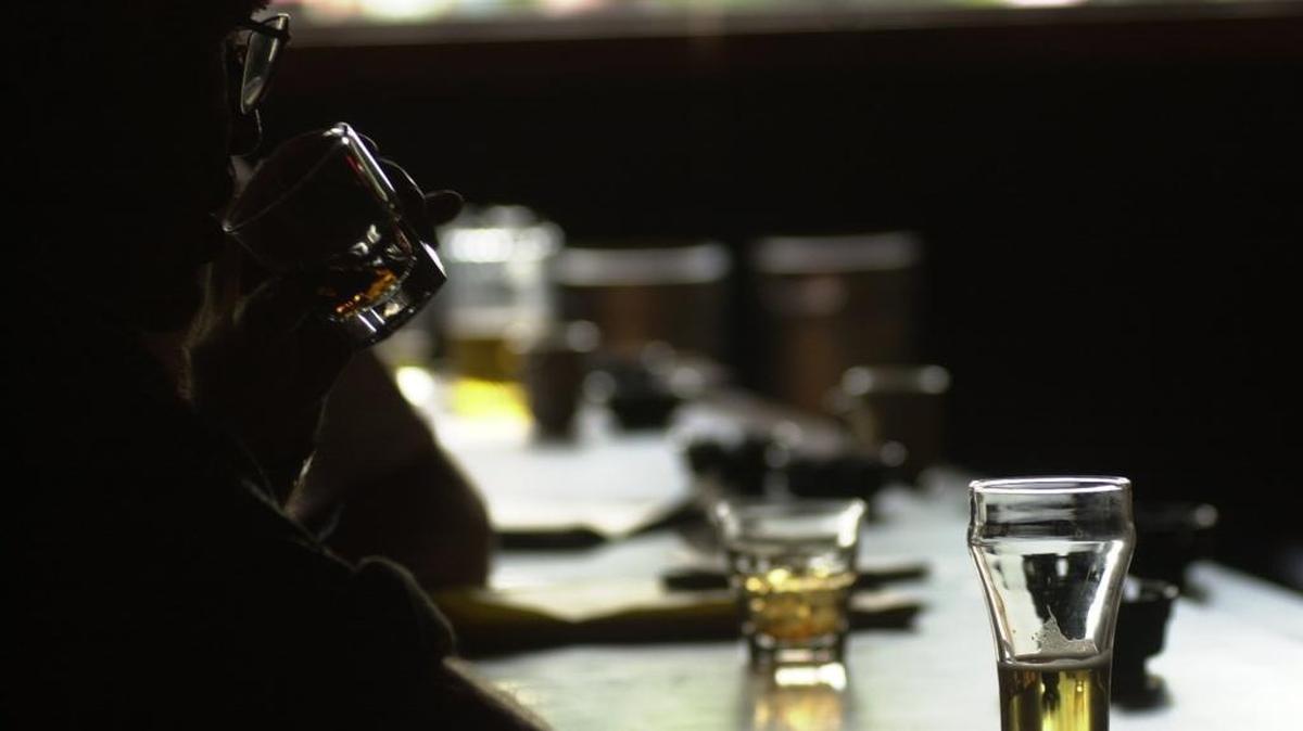 A bargoer sips his drink inside the Cactus Bar on Main Street in Downtown Boise.