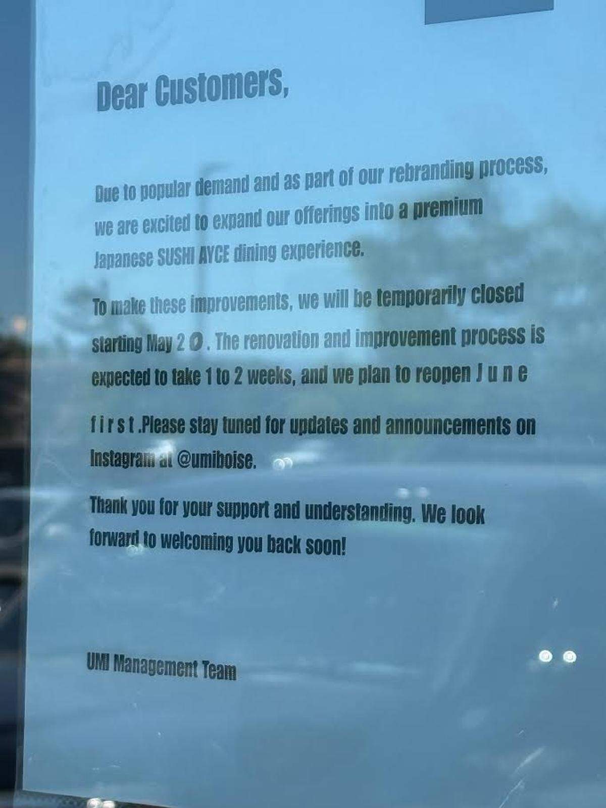 A note on the door at Umi Japanese Shabu Shabu explains its temporary closure.