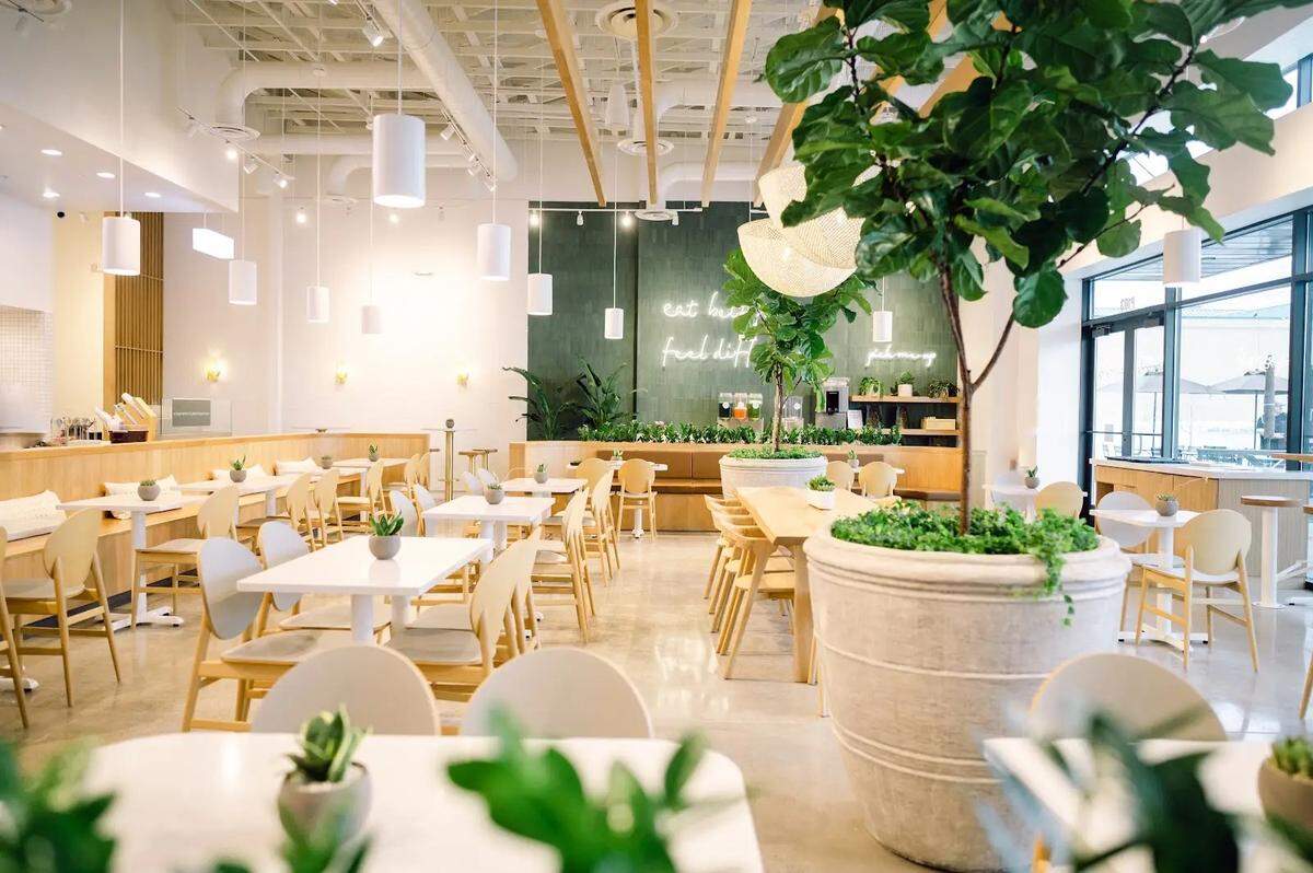 Aubergine Kitchen describes its restaurant environment as a “signature warm atmosphere.”