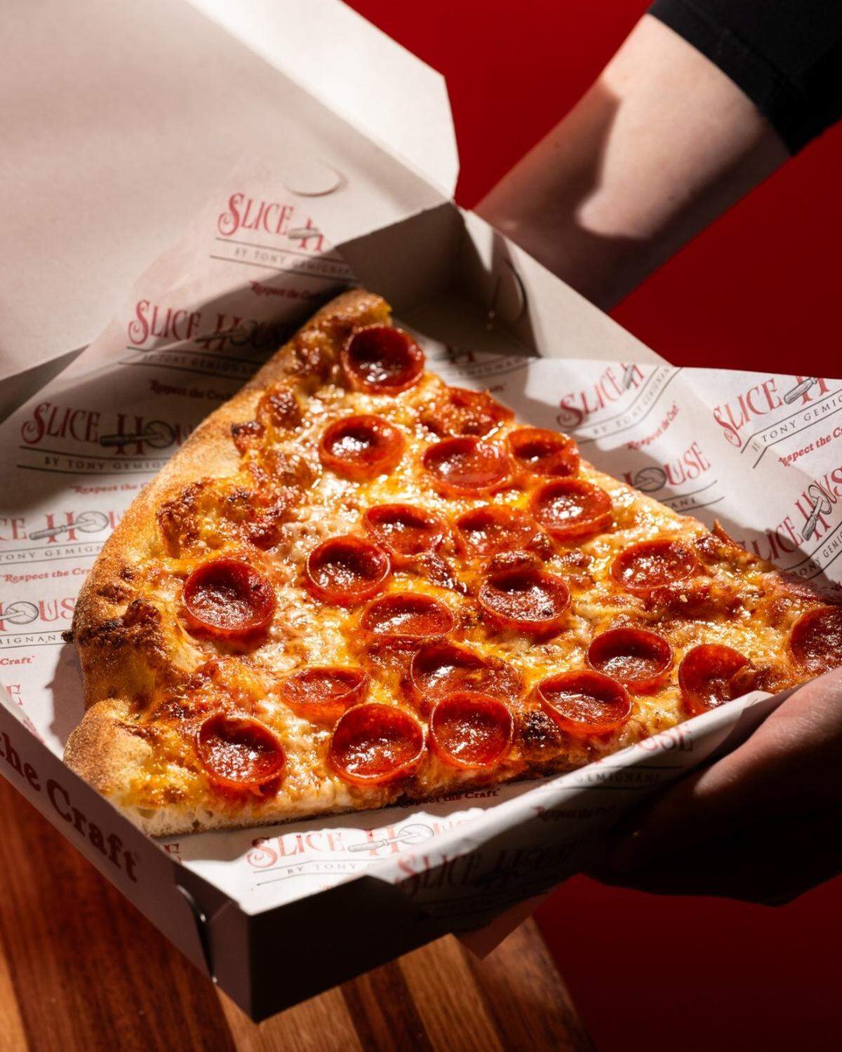 With a restaurant name like that, you know the place sells pizza by the slice.