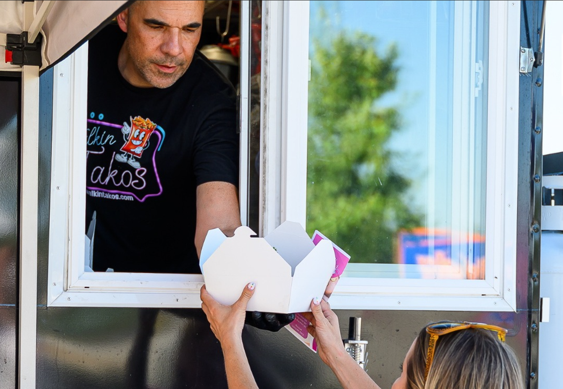 Walkin Takos co-owner David Eisenhauer has been serving customers for more than two years from the food trailer.