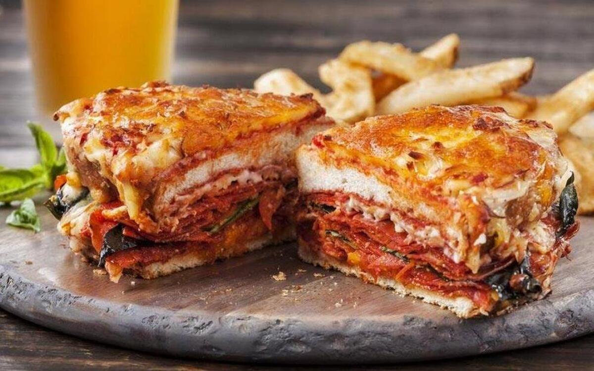 You’ll need a fork for the Leaning Tower of Pizza ($12.75). It’s a baked sandwich on Texas toast loaded with pepperoni and fresh basil — and topped with cheesy tomato sauce.
