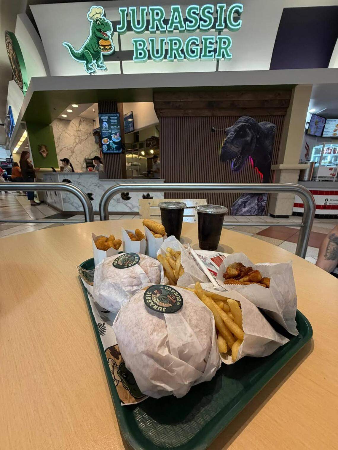 Jurassic Burger is now serving fast food inside Boise Towne Square mall.