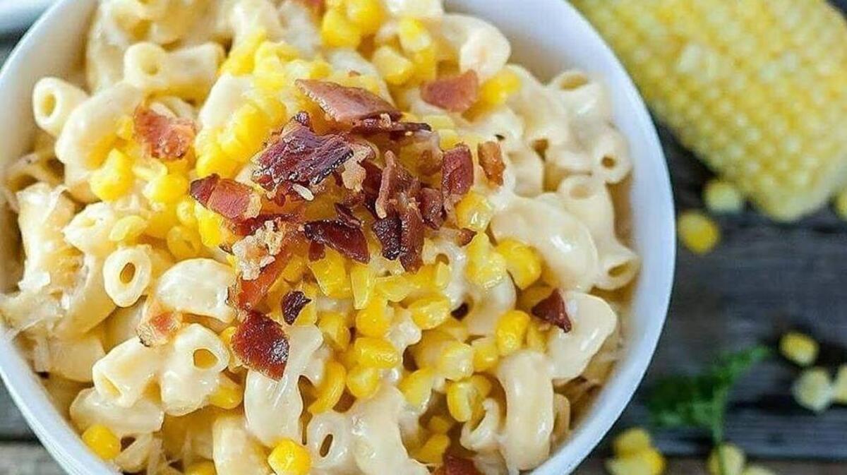 A bowl of Southern Comfort ($8.50) is filled with Mad Mac’s classic macaroni and cheese topped with corn and crispy bacon.