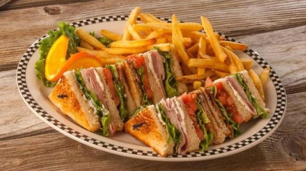 Turkey Club Sandwich ($10.99): Triple-decker stacked with roasted turkey breast, bacon, ham, tomato, lettuce and mayonnaise.