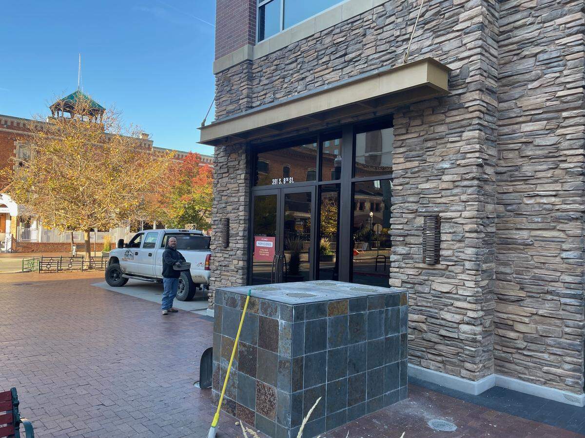 JPM Demolition foreman William Goodman pauses while putting finishing touches on statue removal Thursday outside P.F. Chang’s.