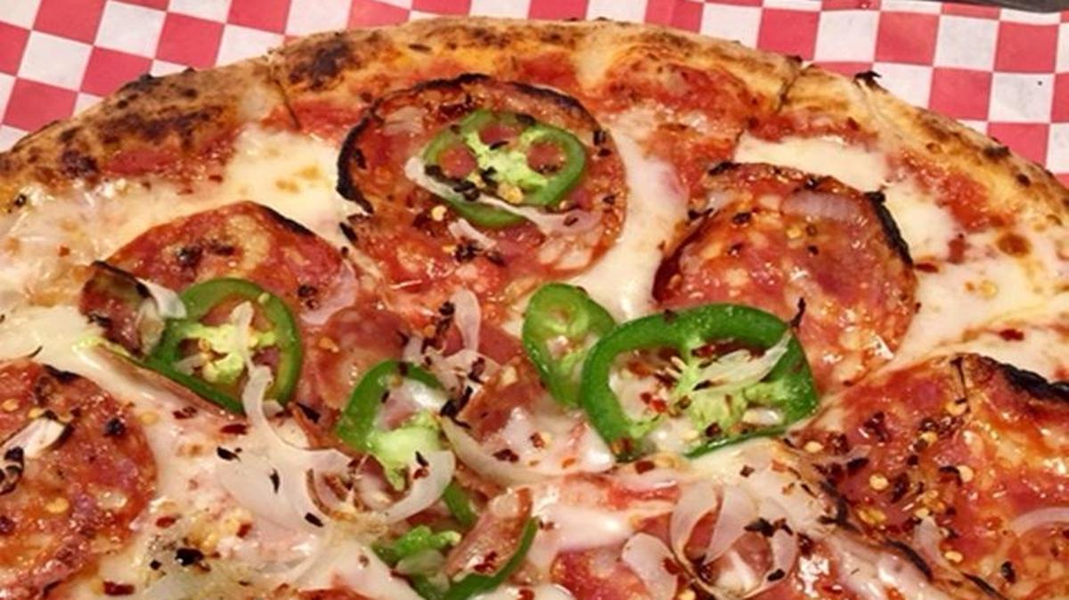 The Spicy Calabrese ($17) at Pizzeria Sazio: Calabrese salami, jalapeno, Calabrian peppers, cipollini onions and red sauce.