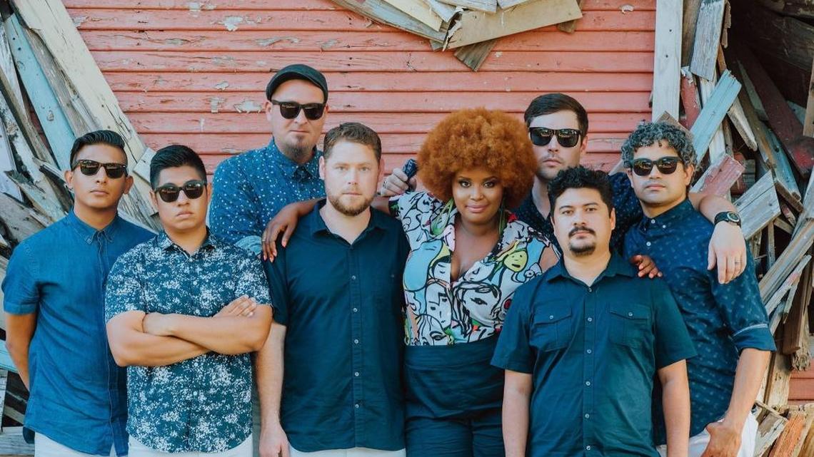 The Suffers recently streamlined from a 10-piece into an eight-piece band. “Life happens. Tour happens,” explains singer Kam Franklin, fourth from right. “We’re still going strong.”
