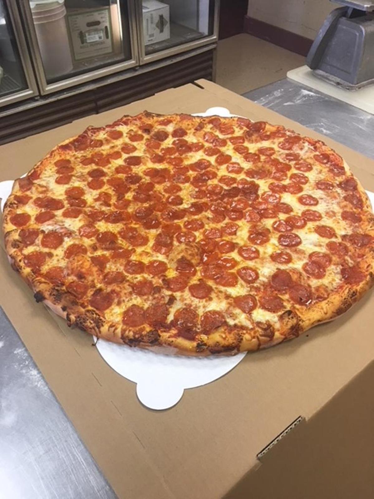 You and an eating partner have an hour to annihilate this 28-inch pizza at Garbonzo’s.