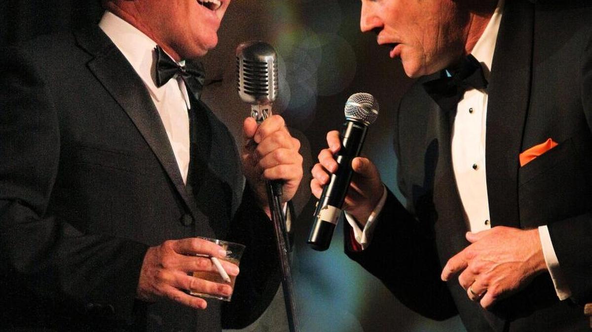 Bob Caudle and Dave Halstrom double for Dean Martin and Frank Sinatra in “Rat Pack Fun” at the Nampa Civic Center on Friday, Dec. 4.