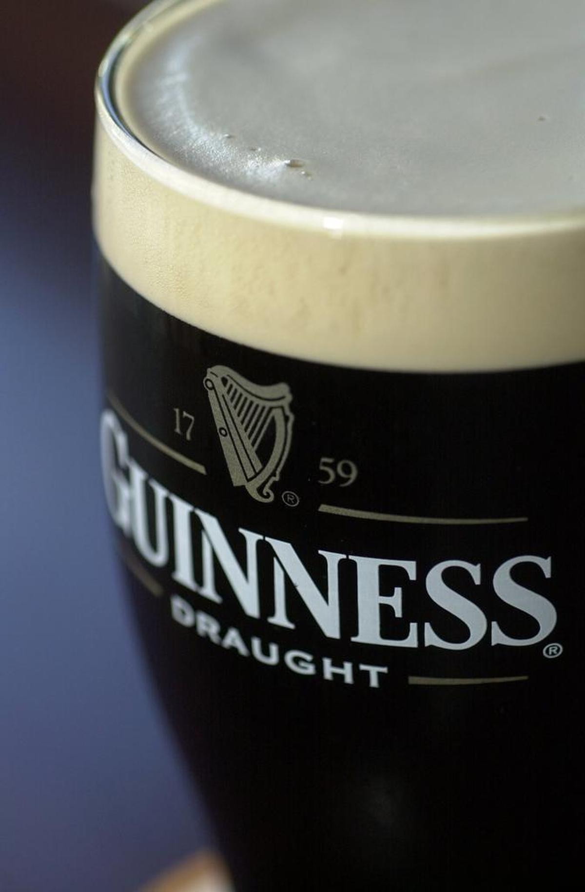 A pint of Guinness is the drink of the day on St. Patrick’s Day at area bars.