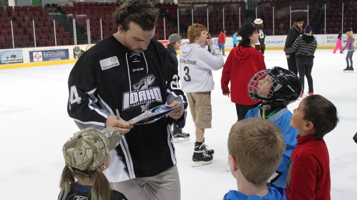 Steelheads player Zach Bell signs autographs at last year’s CenturyLink Free Skate. He will be on hand again this year for the annual event that happens on Sunday, March 12.