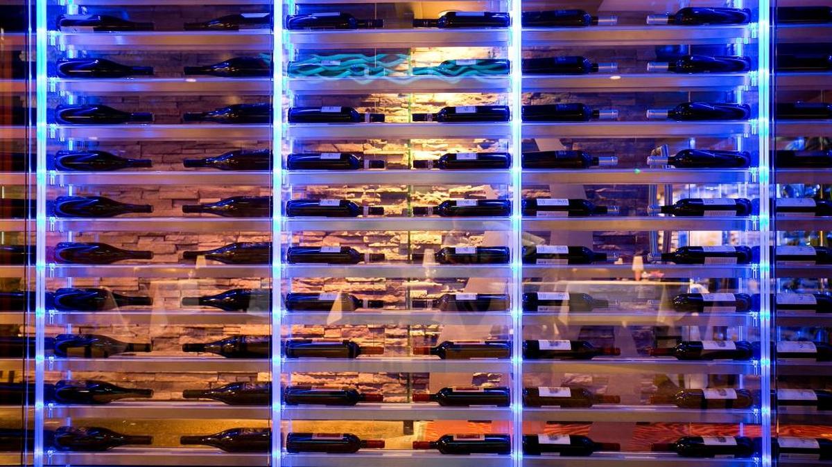 Lighted wine storage in the dining area of Chandlers restaurant.