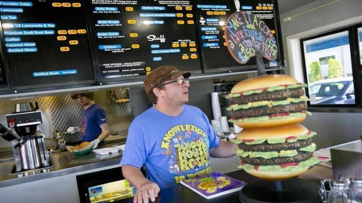 SkyVue Grill owner Rob Good waits to take an order during lunch hour.
