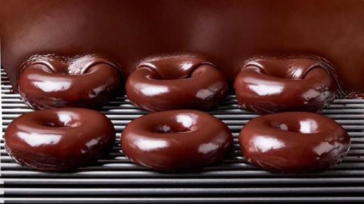 Krispy Kreme is releasing special chocolate glazed doughnuts in celebration of the Great American Eclipse.