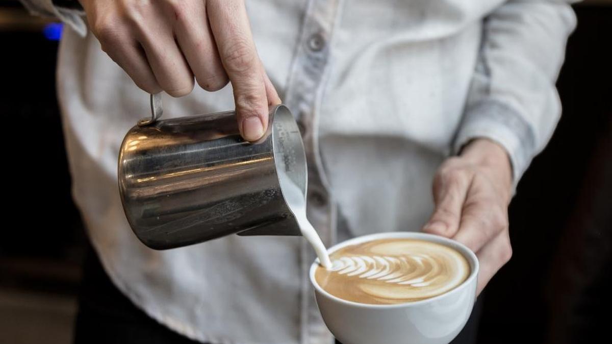 Pouring a latte at Form & Function Coffee in Downtown Boise.
