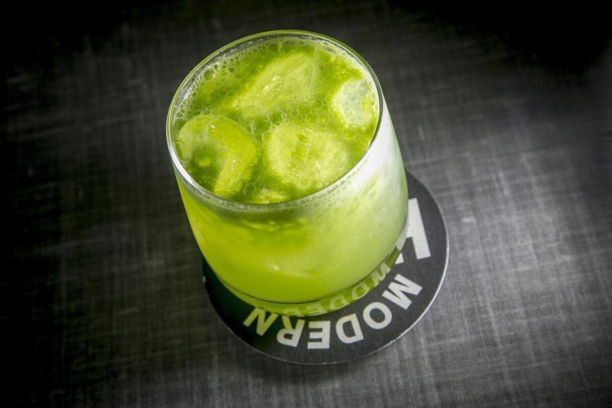 A Celery and Smoke cocktail made with top-shelf mezcal and white tequila, mixed with celery juice, agave nectar and lime juice at The Modern Hotel and Bar in Boise, Idaho. Tuesday June, 06, 2017.