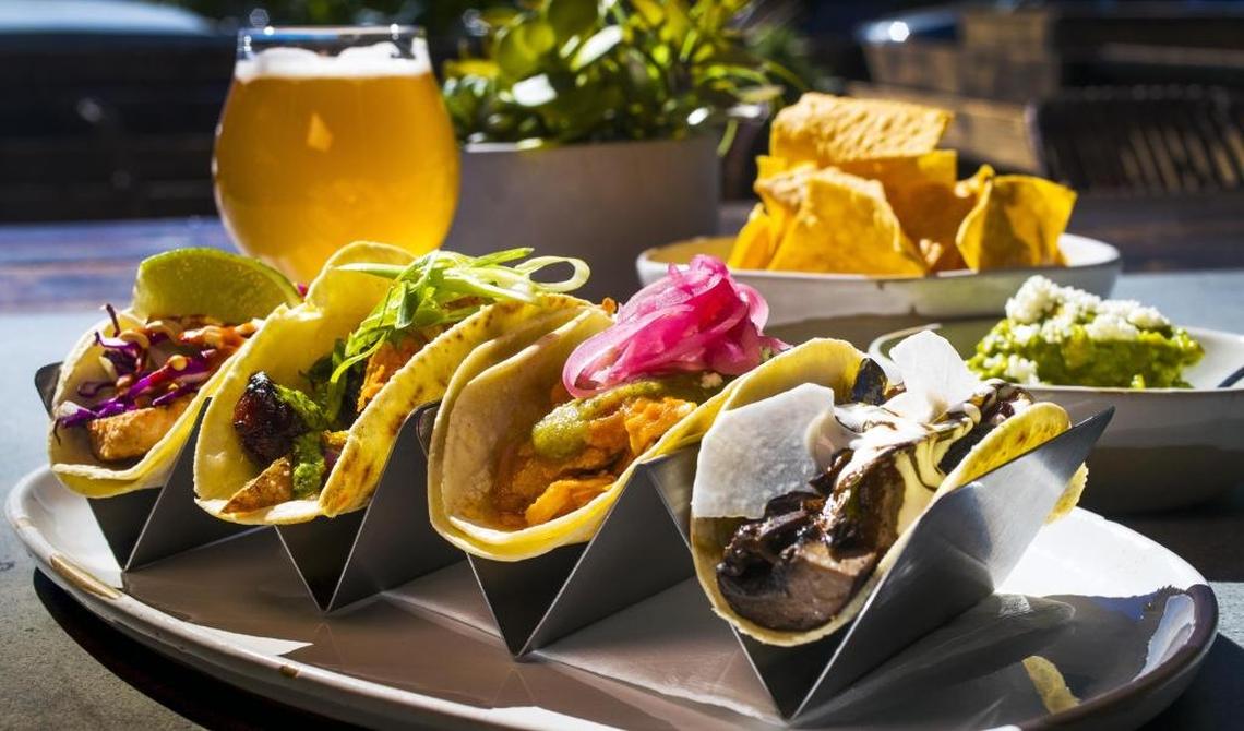 Madre Boutique Taqueria serves up a line of tacos for all tastes. The ensenada fish, left, is filled with blackened fish, shaved cabbage and spiced crema. The spud and chorizo, second from left, is stuffed with slices of chorizo, crispy potatoes, tomato mojo, and jalapeno pesto. The chicken tinga is topped with chipotle, pickled onions, house guacamole and fresh cheese. The mushroom taco holds seasoned mushrooms, crispy bacon, melted cheese and salsa roja.