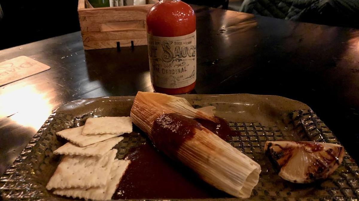 The tamale ($2.75 each) is meant to be eaten covered in hot sauce and stacked atop a saltine.