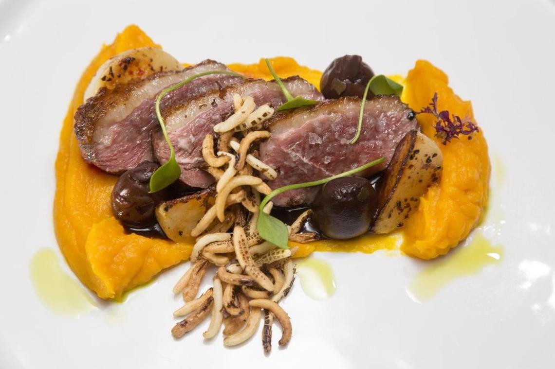 Chef Christian Phernetton's Moulard duck breast with red kuri squash and wild rice.