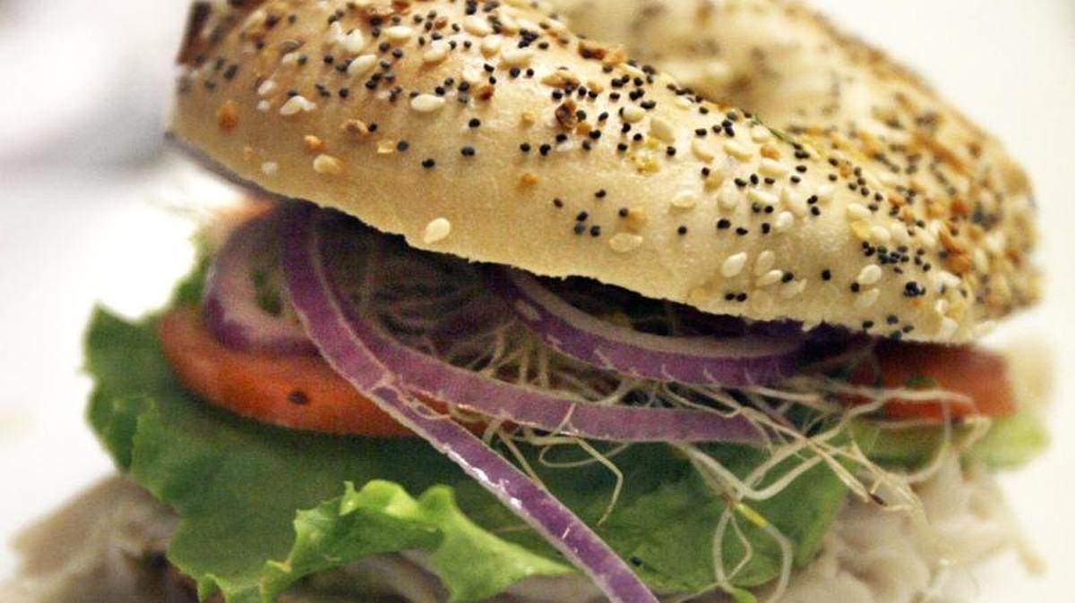 A turkey, red onion, lettuce, tomato and sprouts on an Everything Bagel from Blue Sky Bagels.