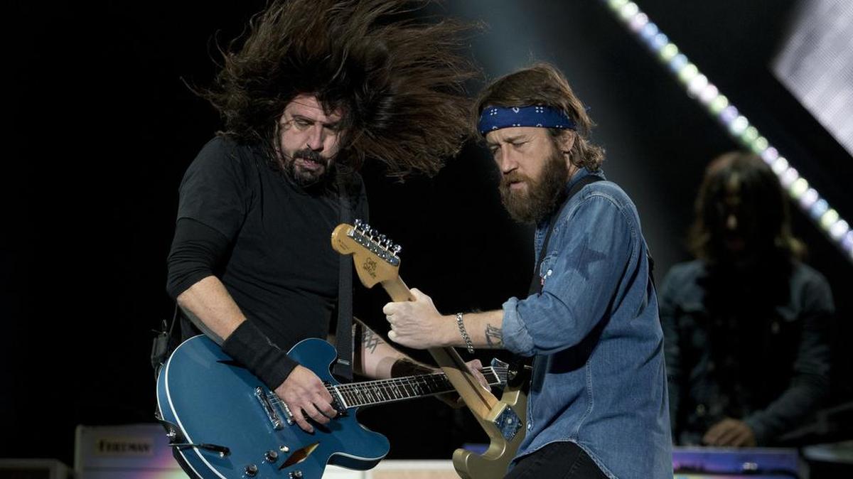 Dave Grohl, left, and Chris Shiflett of the Foo Fighters perform Nov. 18 at the Corona Capital Music Festival in Mexico City.