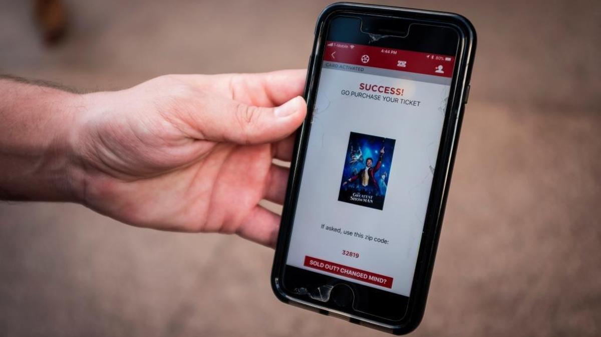 MoviePass members use a smartphone app to check in at the theater.