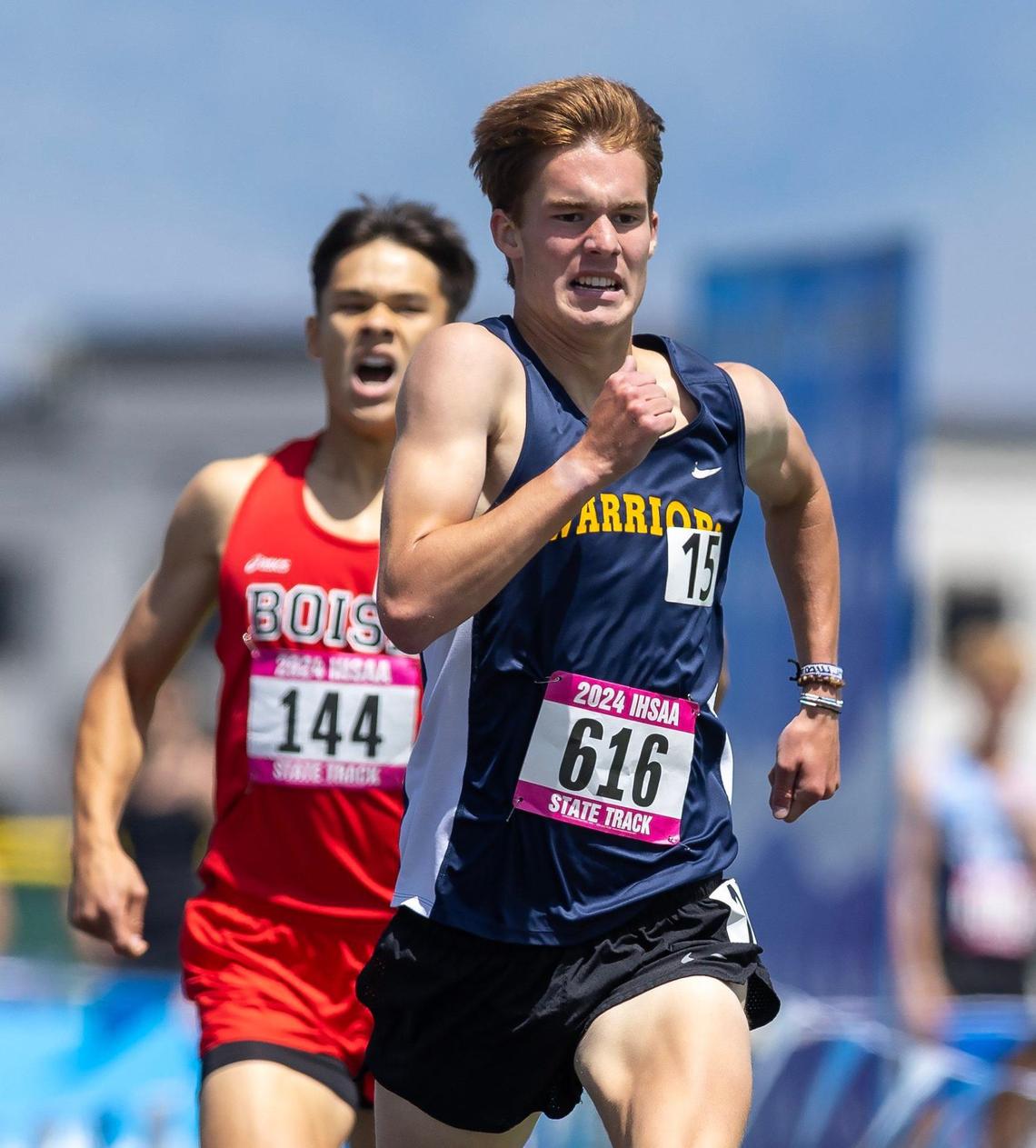 Meridian’s Nate Stadtlander edges out Boise’s Noe Kemper for first place in the 5A boys 1,600 metes at the Idaho high school state track and field championships last May at Mountain View High School.