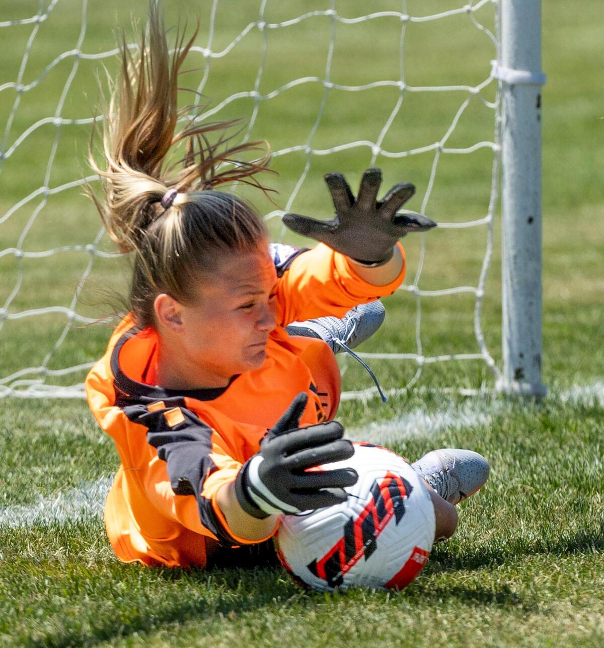 Idaho Rush goalkeeper Isabella Brown stops penalty kick in a shootout against Utah County SC in the U-19 championship at the U.S. Youth Soccer Far West Regionals on Thursday at the Simplot Sports Complex in Boise.