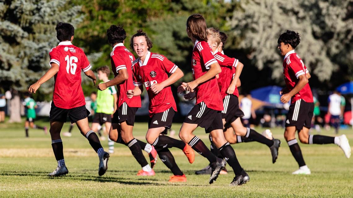 Grayson Carter of the U-14 Boise Timbers boys looks back after scoring the game’s opening goal Saturday against Northern California’s Santa Clara Sporting in the semifinal round at Boise’s Simplot Sports Complex.