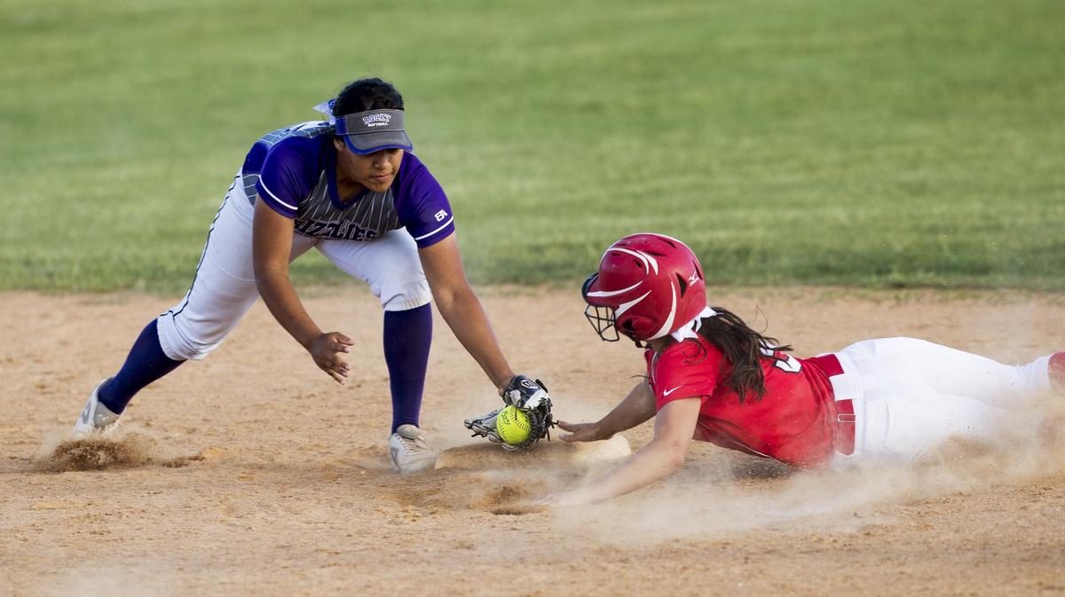 Boise’s Hope Shimatsu avoids the tag of Rocky Mountain’s Kaylan Walker during the district championship game last spring. Both are key returning players for their teams this season.