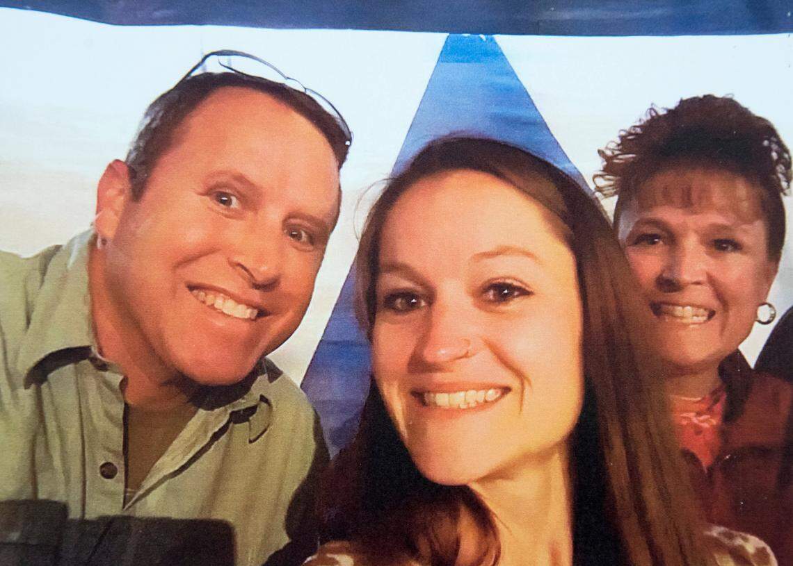 Dawn Jantzen, right, with her daughter, Jaclyn Zabel, and Jantzen's current husband, Daryl. Zabel was murdered in late May by her boyfriend, who then killed himself, authorities say.