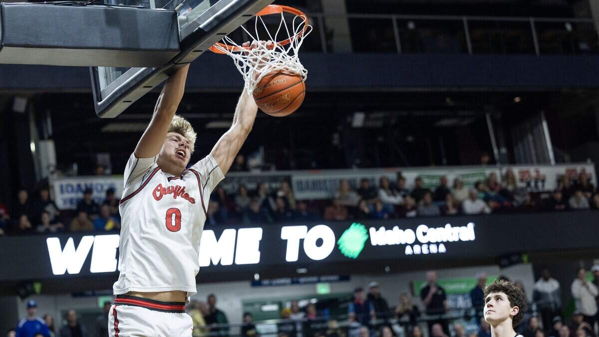 Owyhee senior Ty Read dunks the ball against Centennial in the 6A District Three boys basketball championship game at Idaho Central Arena in downtown Boise, Friday, Feb. 27, 2026.