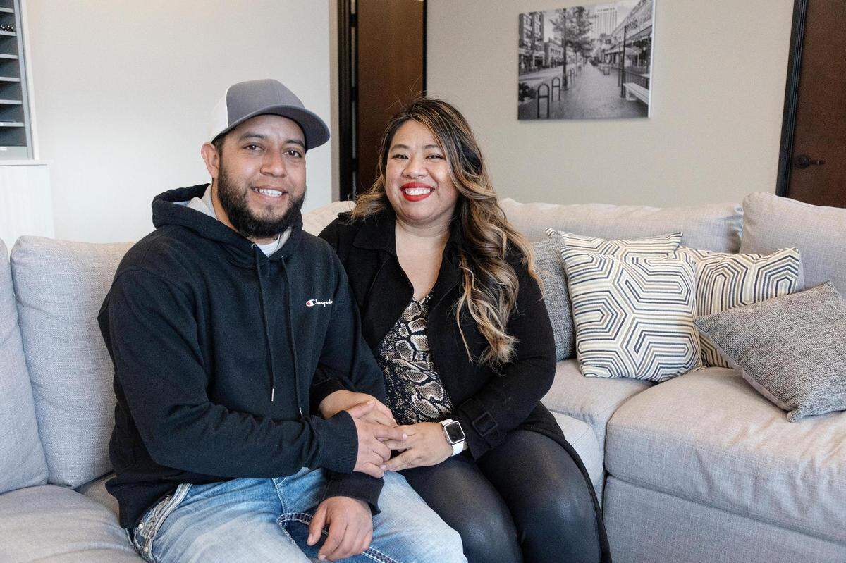 Diego and Anabel Ayala, shown in their real estate agent’s office, just bought a home in Nampa.