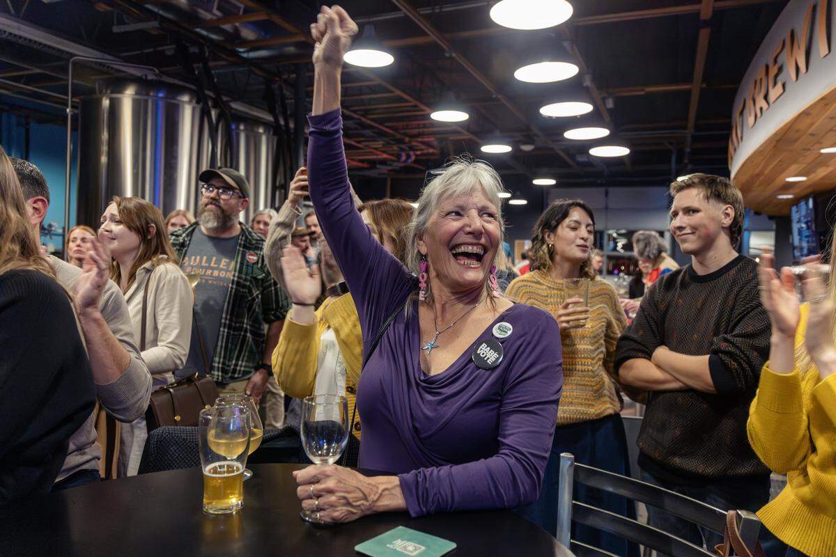 Voter Sam Sandmire cheers as Boise City Council candidate Jimmy Hallyburton gives a speech at an election night watch party held at Clairvoyant Brewing Company, Tuesday, Nov. 4, 2025.