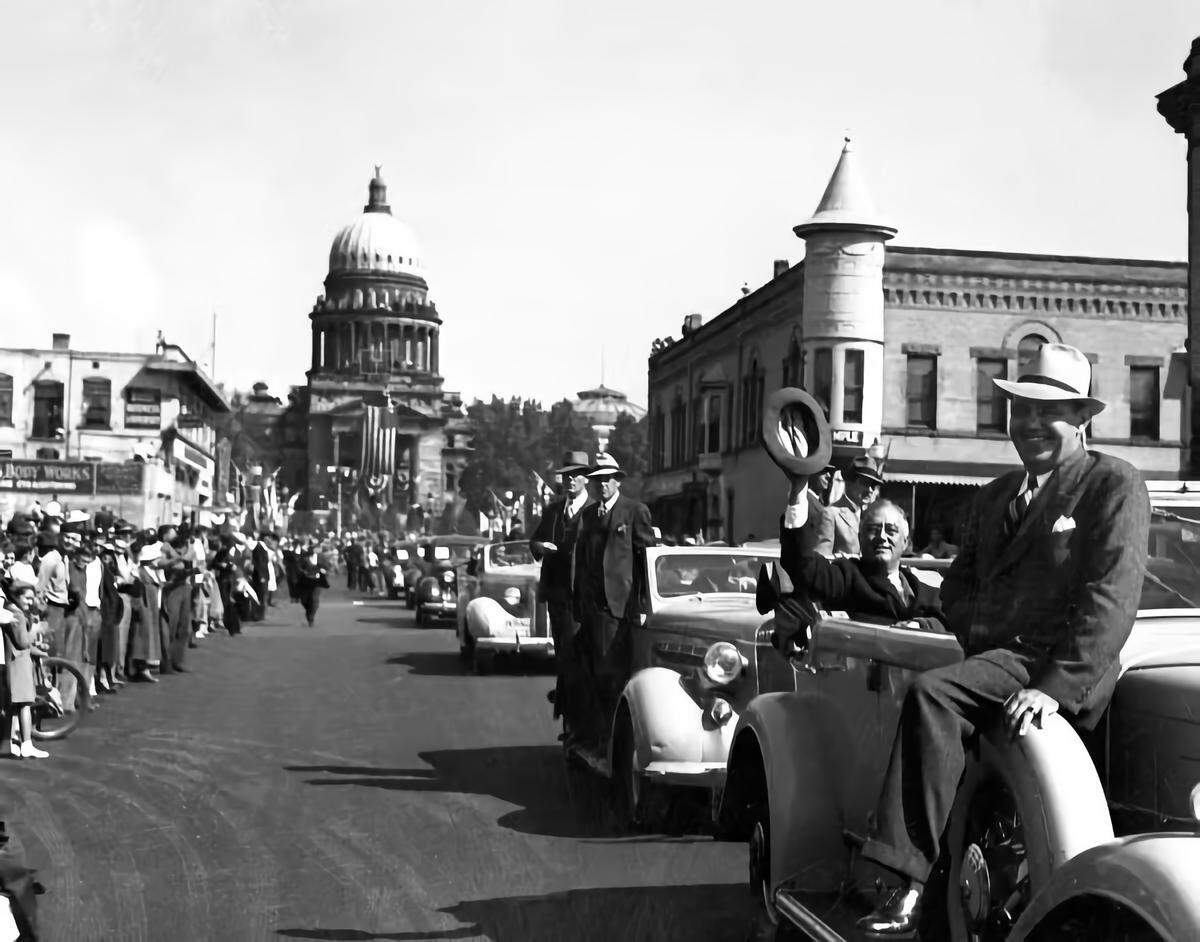 President Franklin D. Roosevelt visited Boise in 1937 and passed down Capitol Boulevard, shown here with the Capitol in background at left and the 1902-built Adelmann Building at right, with its iconic pagoda turret.