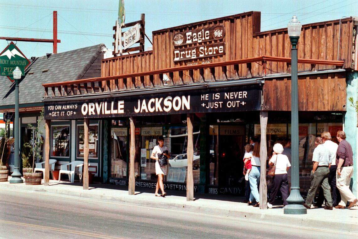 The historic Orville Jackson building on State Street is a landmark in downtown Eagle. In this 1997 photo, locals walk past the drug store.