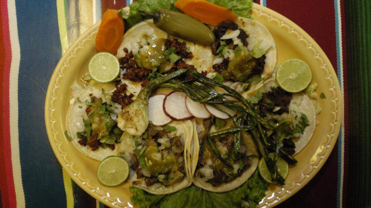 El Gallo Giro has “Our Famous Tacos” -- choose from 10 kinds, including adobada, chorizo and lengua -- plus authentic central Mexican fare.