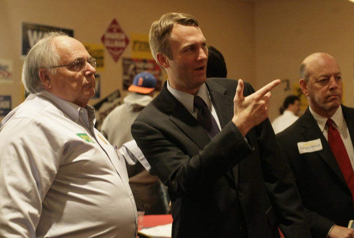 Vaughn Ward talks with Milford Terrell during his time on the State Board of Education.